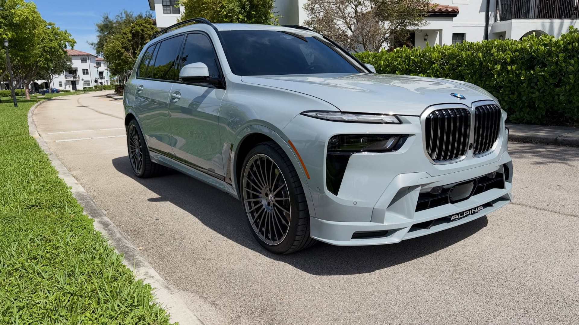 Ceramic coated BMW Alpina XB7 gleaming in South Florida sun